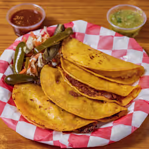 El Canaston signature dishes Street TacoBurritoQuesadilla